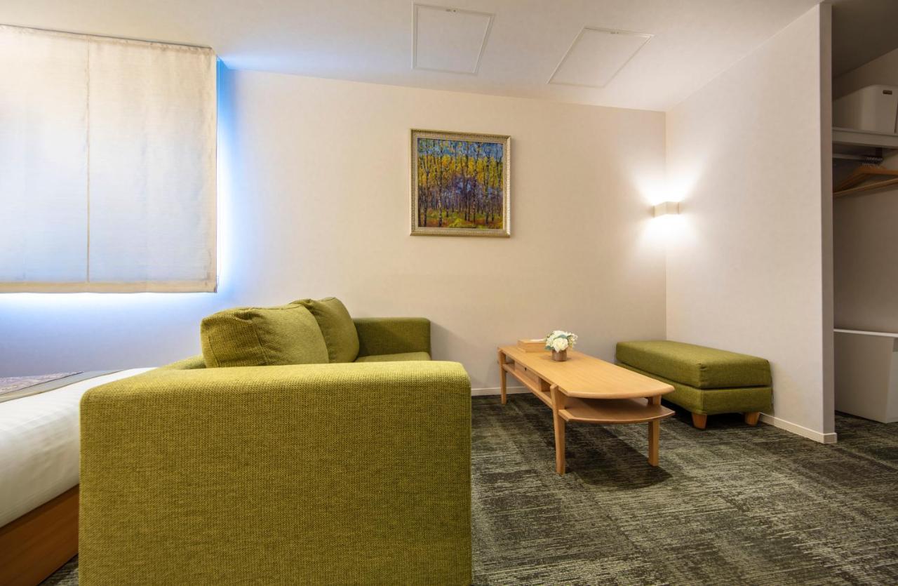 Grand Base Okayama Ekimae Aparthotel Ngoại thất bức ảnh