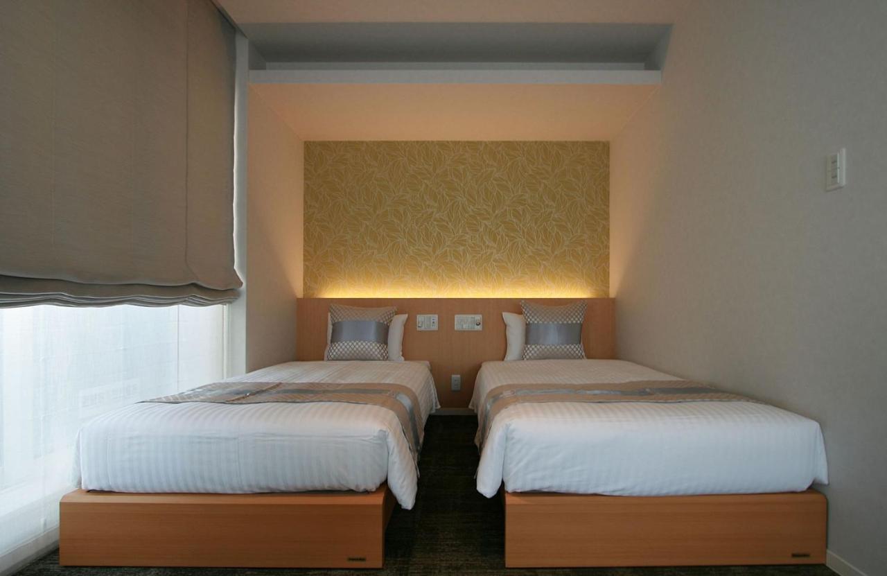 Grand Base Okayama Ekimae Aparthotel Ngoại thất bức ảnh