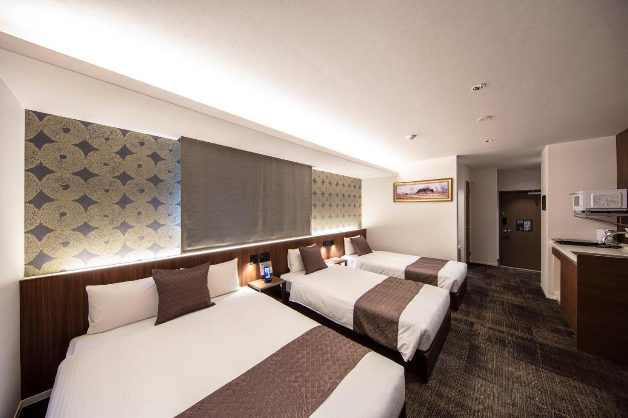 Grand Base Okayama Ekimae Aparthotel Ngoại thất bức ảnh
