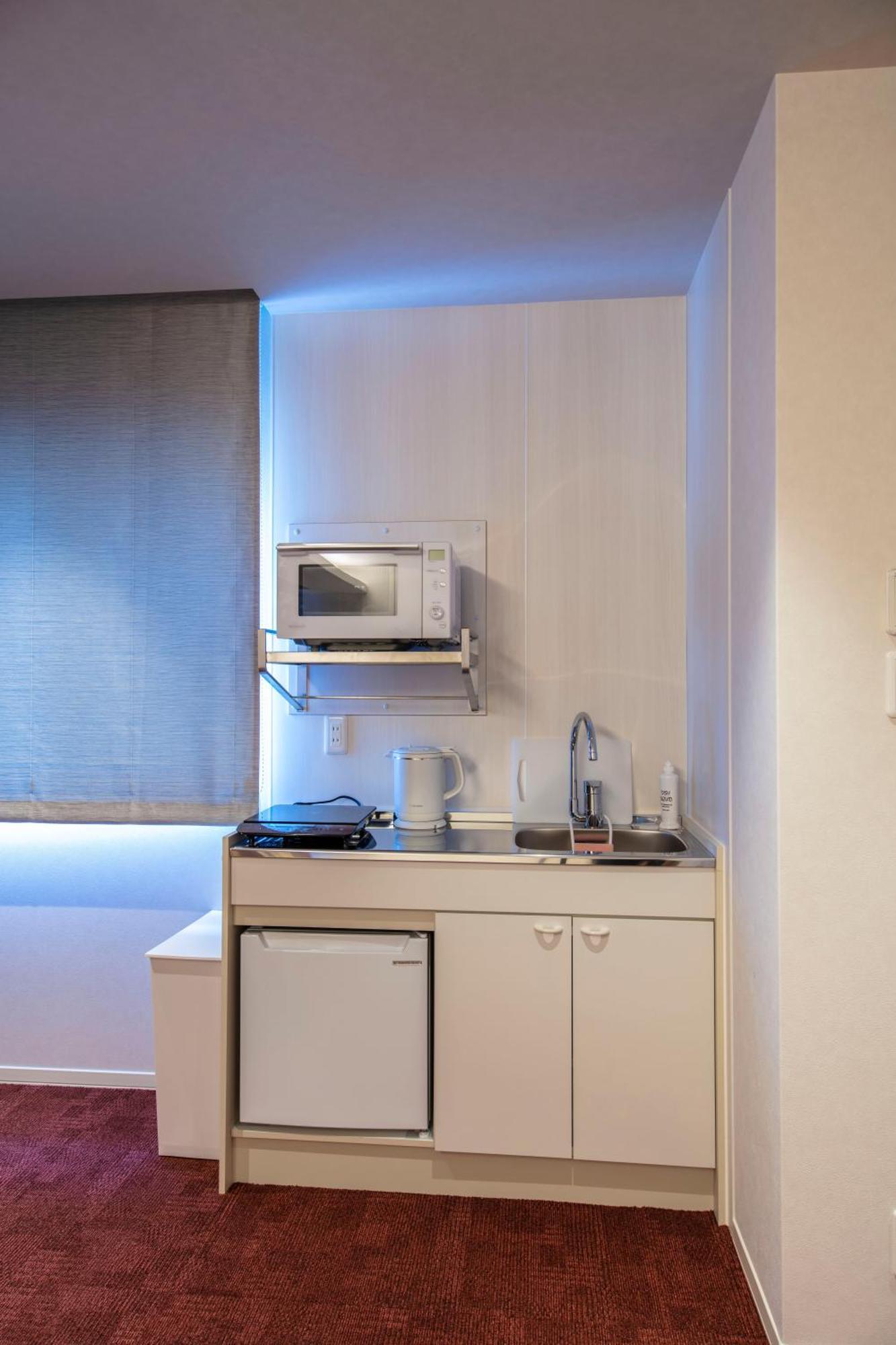 Grand Base Okayama Ekimae Aparthotel Ngoại thất bức ảnh
